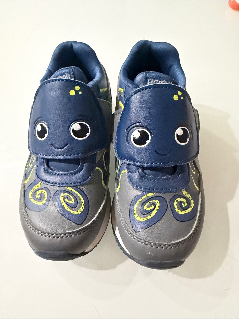 Reebok Kids Gray, White, and Blue Low-Top Sneakers. Toddler Octopus sneakers.